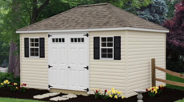 Hip-roof style shed with vinyl siding.