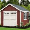 Red Cape Cod Shed with white trim