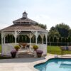 14' octagonal colonial style white vinyl gazebo with pagoda roof, cupola, victorian braces and turned posts