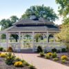 20' x 28' oval colonial style white vinyl gazebo with pagoda roof, cupola and custom weather vane