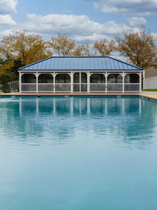 20' x 40' rectangle country style white vinyl gazebo with 5" x 5" posts, gallery blue standing seam and screens