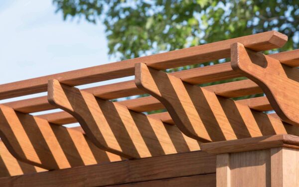 Details of a Santa Fe Pergola in pine on a paver patio