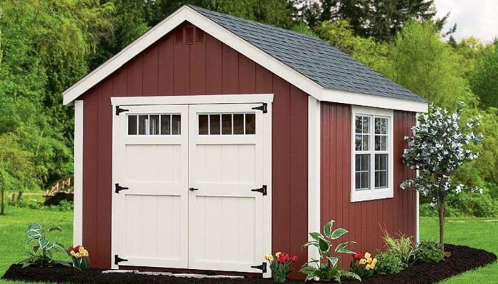 Red Cape Cod Shed with white trim