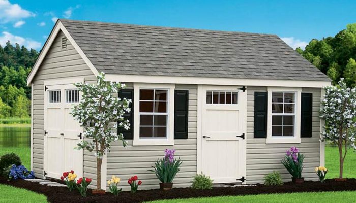Tan Cape Cod Shed with white trim